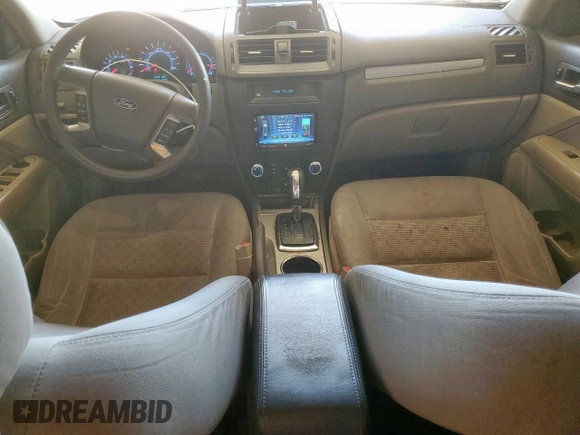 2012 Ford Fusion SE z VIN 3FAHP0HA1CR320160, wystawiony jako Copart lot #57597615 z przebiegiem 142 938 mil mil oraz Szkoda całkowita • Salvage title. Historia ofert i sprzedaży dostępna na DreamBid. Obrazek 8.