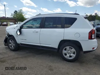 2014 Jeep Compass Sport with VIN 1C4NJCBA5ED844934, listed as a Copart auction lot 52774945 with 148,897 mi miles and Salvage Title. Bid and sale history available at carsss.com. Image 2.