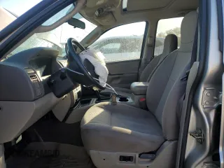 2003 Jeep Grand Cherokee Laredo z VIN 1J4GX48N63C509220, wystawiony jako Copart lot #72730964 z przebiegiem 95 216 mil mil oraz Szkoda całkowita • Salvage title. Historia ofert i sprzedaży dostępna na DreamBid. Obrazek 7.