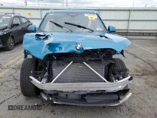 2025 BMW X1 xDrive28i z VIN WBX73EF06S5070458, wystawiony jako Copart lot #59026785 z przebiegiem Nie podano mil oraz Szkoda całkowita • Salvage title. Historia ofert i sprzedaży dostępna na DreamBid. Obrazek 5.