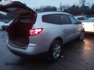 2013 Chevrolet Traverse LT with VIN 1GNKVGKD9DJ265459, listed as a IAAI auction lot 41448161 with 170,527 mi miles and . Bid and sale history available at DreamBid. Image 4.
