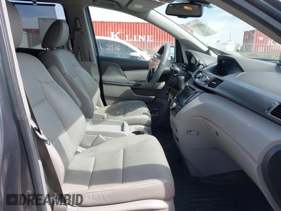 2014 Honda Odyssey Touring with VIN 5FNRL5H91EB093540, listed as a IAAI auction lot 41887412 with 202,076 mi miles and . Bid and sale history available at DreamBid. Image 5.