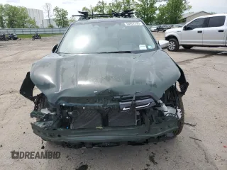 2024 Subaru Forester Touring with VIN JF2SKAMC8RH432381, listed as a Copart auction lot 56957295 with 62,132 mi miles and Salvage title. Bid and sale history available at DreamBid. Image 5.