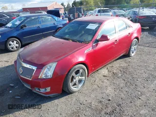 2008 Cadillac CTS RWD w/1SB with VIN 1G6DR57V580212574, listed as a IAAI auction lot 42010537 with 122,390 mi miles. Bid and sale history available at carsss.com. Image 2.