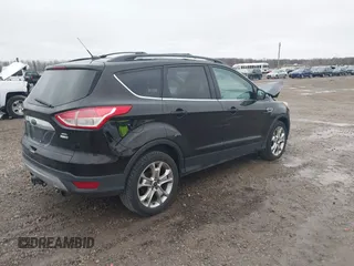 2013 Ford Escape SEL with VIN 1FMCU9H95DUC64995, listed as a IAAI auction lot 40821020 with 120,114 mi miles. Bid and sale history available at carsss.com. Image 4.