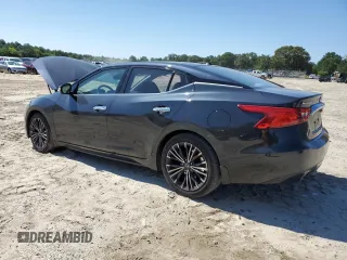 2016 Nissan Maxima SR with VIN 1N4AA6AP1GC428108, listed as a Copart auction lot 57221335 with 90,473 mi miles and Salvage title. Bid and sale history available at DreamBid. Image 2.
