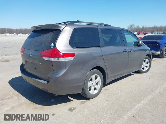 2012 Toyota Sienna LE AAS with VIN 5TDKK3DC8CS269924, listed as a IAAI auction lot 41764722 with 176,968 mi miles. Bid and sale history available at carsss.com. Image 4.