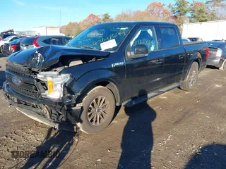 2018 Ford F-150 XL with VIN 1FTEW1EP7JFB77823, listed as a IAAI auction lot 40942694 with 163,078 mi miles. Bid and sale history available at carsss.com. Image 17.
