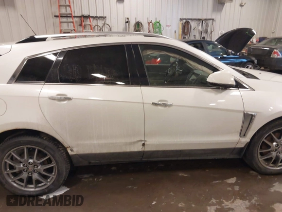 2015 Cadillac SRX Premium Collection with VIN 3GYFNGE32FS564168, listed as a IAAI auction lot 41355787 with 182,949 mi miles. Bid and sale history available at carsss.com. Image 13.