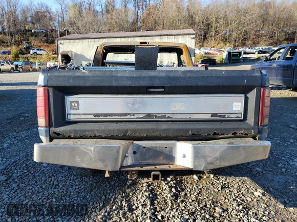 1986 Ford F-150 with VIN 1FTEF14H7GNB46015, listed as a Copart auction lot 80076324 with 0 mi miles and Salvage Title. Bid and sale history available at carsss.com. Image 6.