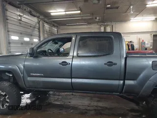 2009 Toyota Tacoma with VIN 5TEMU52N99Z668548, listed as a IAAI auction lot 41507218 with 153,565 mi miles and . Bid and sale history available at DreamBid. Image 14.
