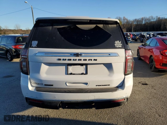 2022 Chevrolet Suburban Premier with VIN 1GNSKFKT7NR242288, listed as a Copart auction lot 79420734 with 77,006 mi miles and Salvage Title. Bid and sale history available at DreamBid. Image 6.