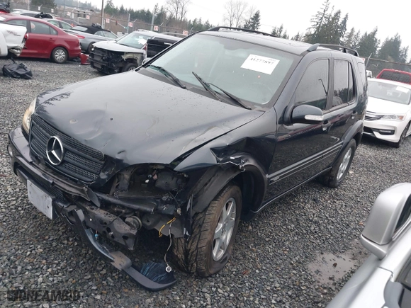 2002 Mercedes-Benz M-Class with VIN 4JGAB54E72A296354, listed as a IAAI auction lot 41277897 with 101,842 mi miles. Bid and sale history available at carsss.com. Image 17.