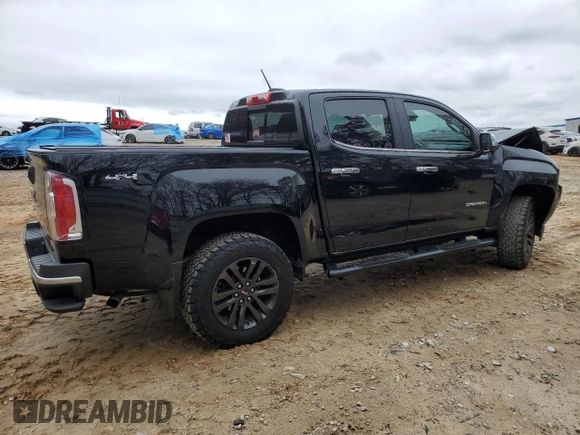2020 GMC Canyon 4WD SLT with VIN 1GTG6DEN4L1130421, listed as a Copart auction lot 49883405 with 49,142 mi miles and Salvage Title. Bid and sale history available at carsss.com. Image 3.