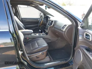 2015 Jeep Grand Cherokee Summit with VIN 1C4RJFJMXFC878812, listed as a IAAI auction lot 41637279 with 149,488 mi miles. Bid and sale history available at carsss.com. Image 5.
