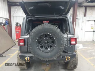 2020 Jeep Wrangler Sport S with VIN 1C4GJXAN4LW229040, listed as a IAAI auction lot 42172180 with 58,701 mi miles and . Bid and sale history available at DreamBid. Image 16.