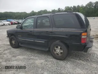 2001 Chevrolet Tahoe LS z VIN 1GNEC13T51J268893, wystawiony jako Copart lot #58527885 z przebiegiem 285 422 mil mil oraz Szkoda całkowita • Salvage title. Historia ofert i sprzedaży dostępna na DreamBid. Obrazek 2.