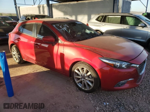 2017 Mazda 3 Grand Touring with VIN JM1BN1M38H1133437, listed as a Copart auction lot 80991974 with 73,810 mi miles and Salvage Title. Bid and sale history available at DreamBid. Image 4.