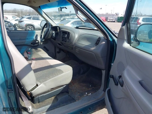 1998 Ford F-150 Standard with VIN 1FTZF1723WNC12776, listed as a IAAI auction lot 41599872 with 125,007 mi miles. Bid and sale history available at carsss.com. Image 5.