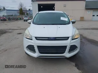 2016 Ford Escape SE with VIN 1FMCU9GX1GUA76589, listed as a IAAI auction lot 42014929 with 125,294 mi miles. Bid and sale history available at carsss.com. Image 12.