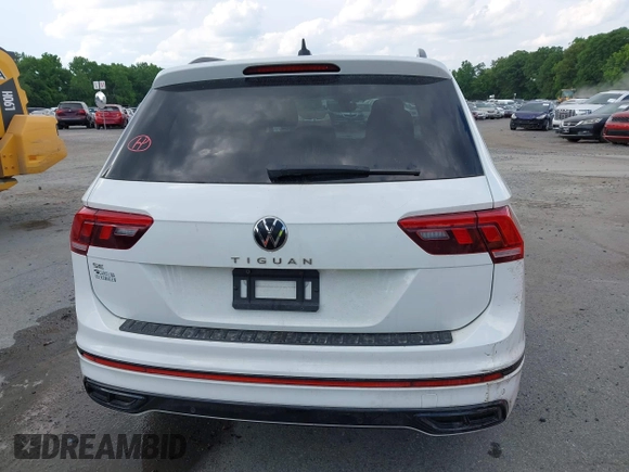 2022 Volkswagen Tiguan SE R-Line Black z VIN 3VVCB7AX3NM009759, wystawiony jako IAAI lot #39075158 z przebiegiem 51 572 mil mil oraz . Historia ofert i sprzedaży dostępna na DreamBid. Obrazek 16.