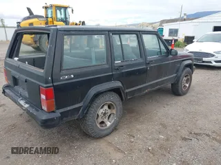 1991 Jeep Cherokee with VIN 1J4FJ88S0ML527479, listed as a IAAI auction lot 42189457 with 321,419 mi miles and . Bid and sale history available at DreamBid. Image 4.
