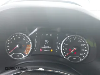 2020 Jeep Renegade Latitude z VIN ZACNJABB8LPL16362, wystawiony jako IAAI lot #42522918 z przebiegiem 59 387 mil mil oraz . Historia ofert i sprzedaży dostępna na DreamBid. Obrazek 7.