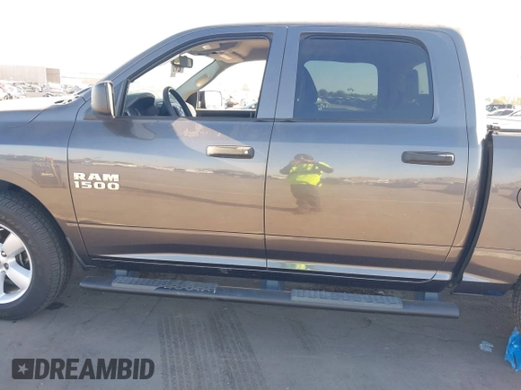2015 Ram 1500 Tradesman with VIN 1C6RR7KG1FS769305, listed as a IAAI auction lot 41337285 with 97,052 mi miles and . Bid and sale history available at DreamBid. Image 14.