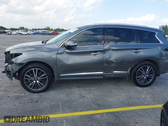 2016 Infiniti QX60 with VIN 5N1AL0MM1GC510760, listed as a IAAI auction lot 41990248 with 60,296 mi miles and . Bid and sale history available at DreamBid. Image 14.