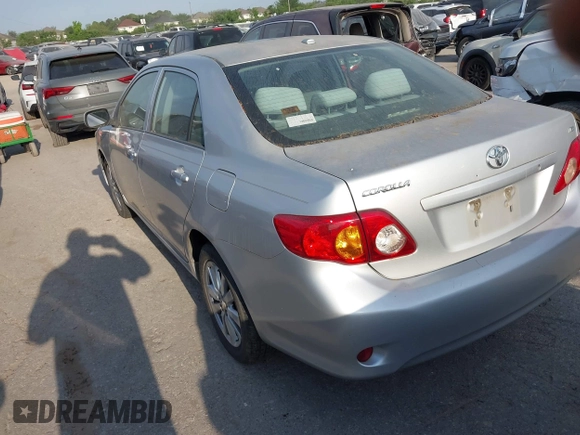 2009 Toyota Corolla with VIN 1NXBU40E59Z078727, listed as a IAAI auction lot 42035739 with 113,814 mi miles. Bid and sale history available at carsss.com. Image 3.
