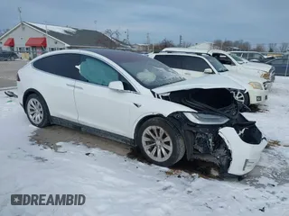 2019 Tesla Model X 75D with VIN 5YJXCDE21KF184361, listed as a IAAI auction lot 41320996 with 72,791 mi miles. Bid and sale history available at carsss.com. Image 1.
