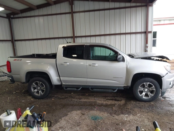 2017 Chevrolet Colorado 2WD Z71 z VIN 1GCGSDEN2H1166403, wystawiony jako IAAI lot #41750594 z przebiegiem 54 454 mil mil oraz . Historia ofert i sprzedaży dostępna na DreamBid. Obrazek 13.