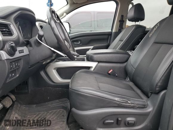 2018 Nissan Titan Pro-4X z VIN 1N6AA1E58JN523036, wystawiony jako Copart lot #45383075 z przebiegiem 153 047 mil mil oraz Czysty tytuł • Clean title. Historia ofert i sprzedaży dostępna na DreamBid. Obrazek 7.