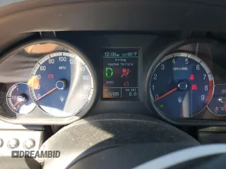 2006 Maserati Quattroporte z VIN ZAMCE39A960023356, wystawiony jako Copart lot #76954384 z przebiegiem 76 185 mil mil oraz Szkody całkowita. Historia ofert i sprzedaży dostępna na DreamBid. Obrazek 9.