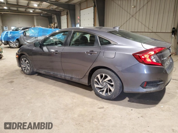 2018 Honda Civic EX with VIN 19XFC2F75JE005057, listed as a Copart auction lot 48601125 with 84,100 mi miles and Salvage Title. Bid and sale history available at DreamBid. Image 2.