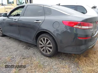 2019 Kia Optima LX z VIN 5XXGT4L38KG319215, wystawiony jako IAAI lot #42226251 z przebiegiem 70 449 mil mil oraz . Historia ofert i sprzedaży dostępna na DreamBid. Obrazek 3.