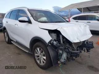 2016 Kia Sorento LX with VIN 5XYPG4A38GG075284, listed as a IAAI auction lot 41233974 with 126,044 mi miles. Bid and sale history available at carsss.com. Image 1.