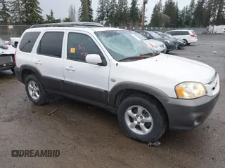 2005 Mazda Tribute S with VIN 4F2CZ94155KM39121, listed as a IAAI auction lot 41431281 with 201,002 mi miles and . Bid and sale history available at DreamBid. Image 1.