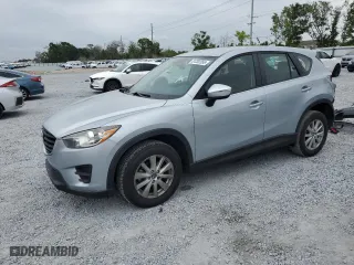 2016 Mazda CX-5 Sport with VIN JM3KE4BY1G0799275, listed as a Copart auction lot 51202355 with 98,409 mi miles and Non Repairable. Bid and sale history available at carsss.com. Image 1.