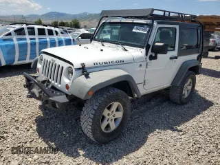 2011 Jeep Wrangler Rubicon with VIN 1J4BA6D12BL535953, listed as a Copart auction lot 59401595 with 77,451 mi miles and Salvage title. Bid and sale history available at DreamBid. Image 1.