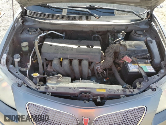 2005 Pontiac Vibe z VIN 5Y2SL63855Z404970, wystawiony jako Copart lot #56750875 z przebiegiem 128 636 mil mil oraz Szkoda całkowita • Salvage title. Historia ofert i sprzedaży dostępna na DreamBid. Obrazek 11.