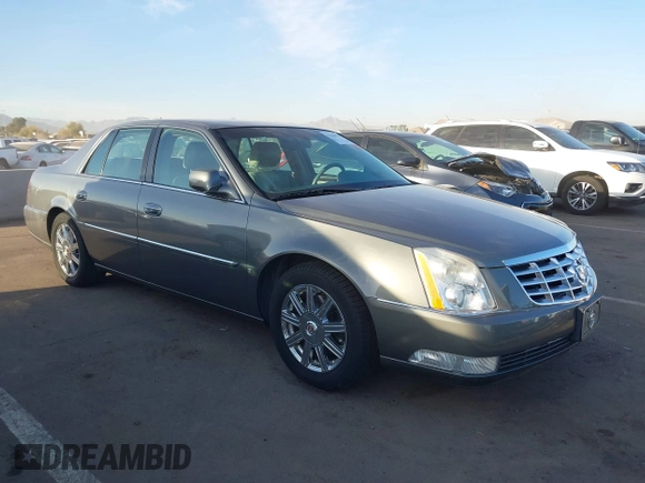 2008 Cadillac DTS 1SA z VIN 1G6KD57Y08U186328, wystawiony jako IAAI lot #41618974 z przebiegiem 71 920 mil mil oraz . Historia ofert i sprzedaży dostępna na DreamBid. Obrazek 1.