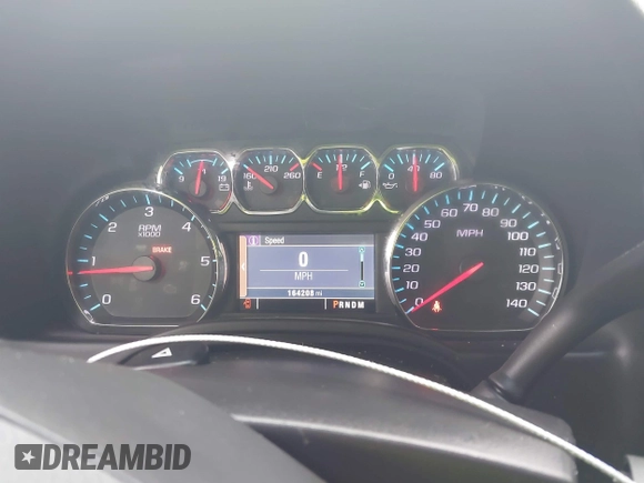 2015 Chevrolet Tahoe LS with VIN 1GNSCAKC0FR245826, listed as a IAAI auction lot 42282590 with 164,208 mi miles and . Bid and sale history available at DreamBid. Image 7.