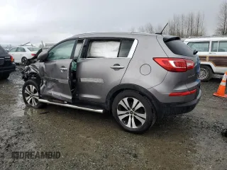 2013 Kia Sportage EX with VIN KNDPCCA24D7401149, listed as a Copart auction lot 48979365 with Not provided miles and Salvage title. Bid and sale history available at DreamBid. Image 2.