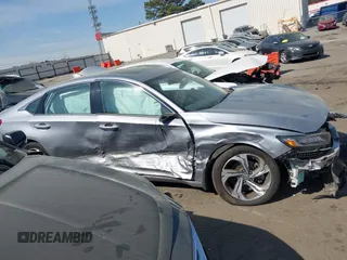 2018 Honda Accord EX-L z VIN 1HGCV2F57JA014214, wystawiony jako IAAI lot #41909287 z przebiegiem 81 388 mil mil oraz . Historia ofert i sprzedaży dostępna na DreamBid. Obrazek 12.