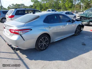 2018 Toyota Camry LE with VIN 4T1B11HK7JU099875, listed as a IAAI auction lot 41503123 with 60,202 mi miles. Bid and sale history available at carsss.com. Image 4.