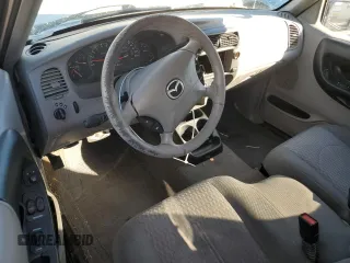 2002 Mazda B-Series 2WD Truck DS with VIN 4F4YR16U82TM03063, listed as a Copart auction lot 80309714 with 133,352 mi miles and Salvage Title. Bid and sale history available at carsss.com. Image 8.
