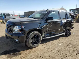 2019 Chevrolet Tahoe Premier with VIN 1GNSKCKJ4KR406220, listed as a Copart auction lot 50491344 with 37,254 mi miles and Salvage title. Bid and sale history available at DreamBid. Image 1.