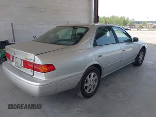 2000 Toyota Camry LE z VIN JT2BF22K2Y0239961, wystawiony jako IAAI lot #42128226 z przebiegiem 154 691 mil mil oraz . Historia ofert i sprzedaży dostępna na DreamBid. Obrazek 4.
