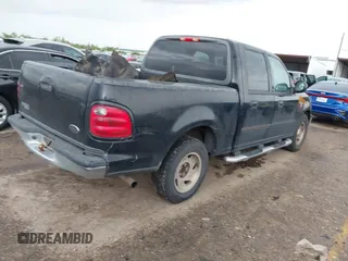 2003 Ford F-150 XLT with VIN 1FTRW07623KD67409, listed as a IAAI auction lot 41912067 with Not Provided miles. Bid and sale history available at carsss.com. Image 4.
